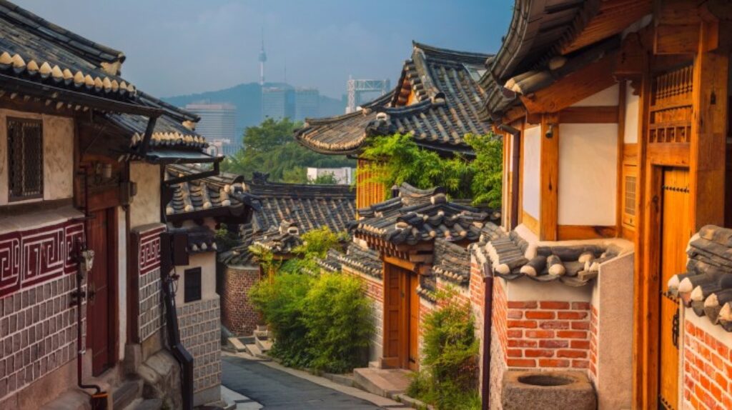 Visit Bukchon Hanok Village to get transported back to time to the old ways of South Korea